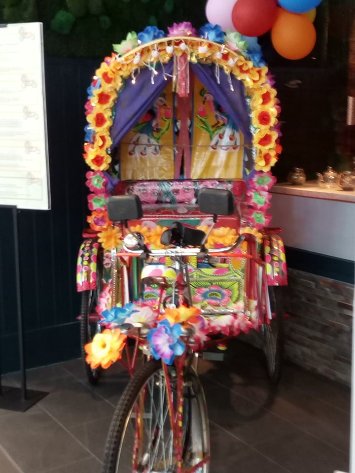 Decorated bicycle outside restaurant in Union Square, Aberdeen