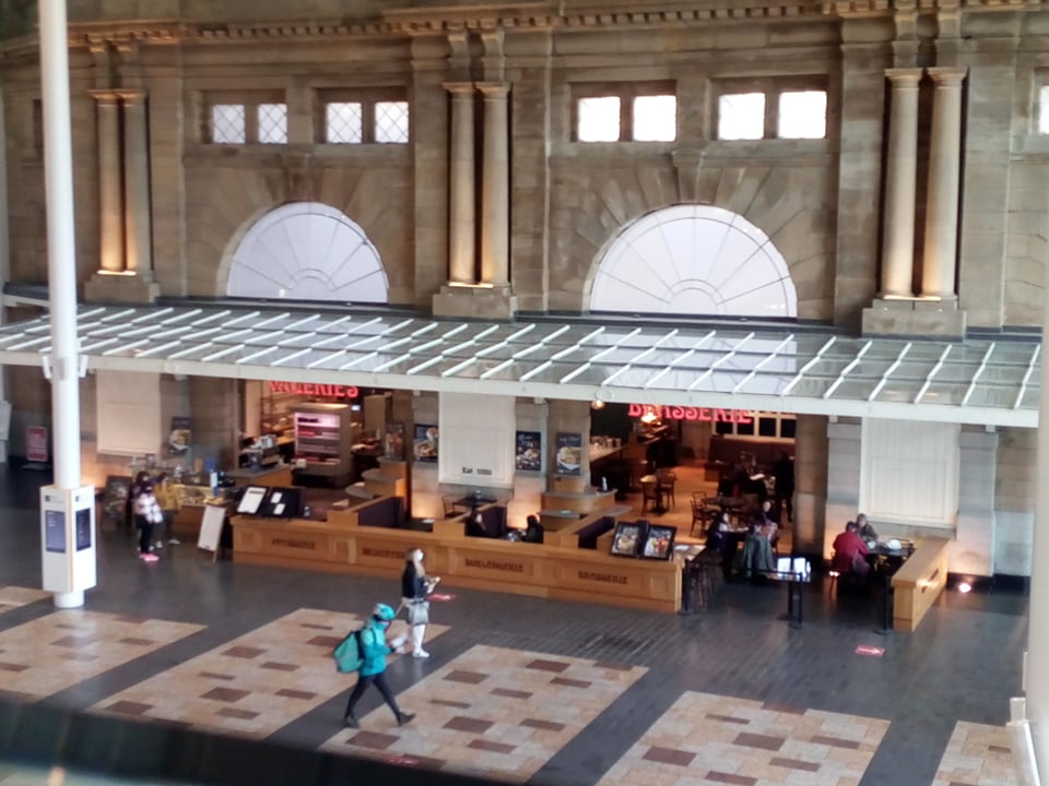 Union Square shopping centre with walls of Aberdeen Train Station in background