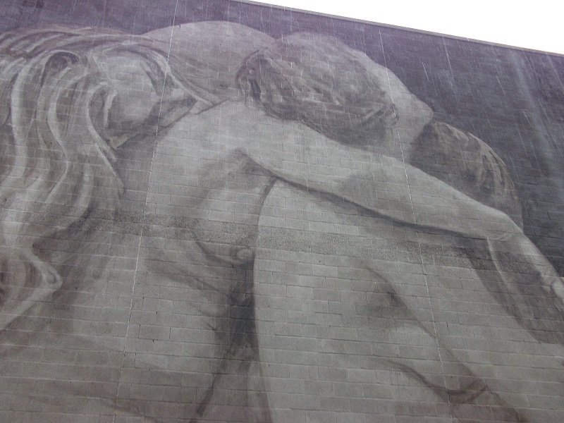street art showing a couple embracing