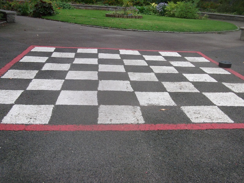 a giant chessboard painted on the ground