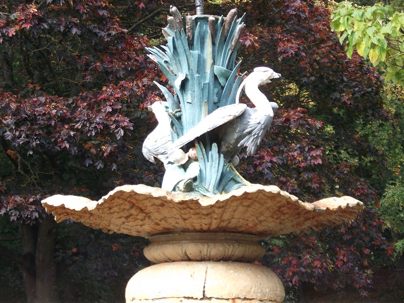 head of fountain, featuring two birds