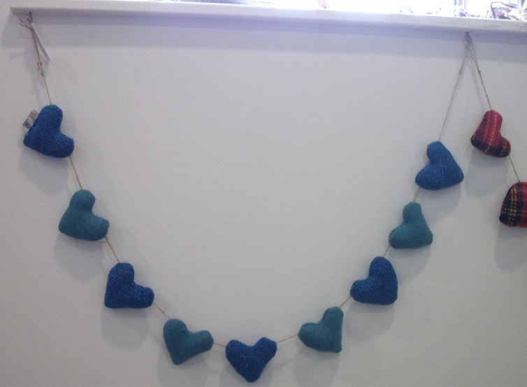 blue felt hearts hanging in a loop