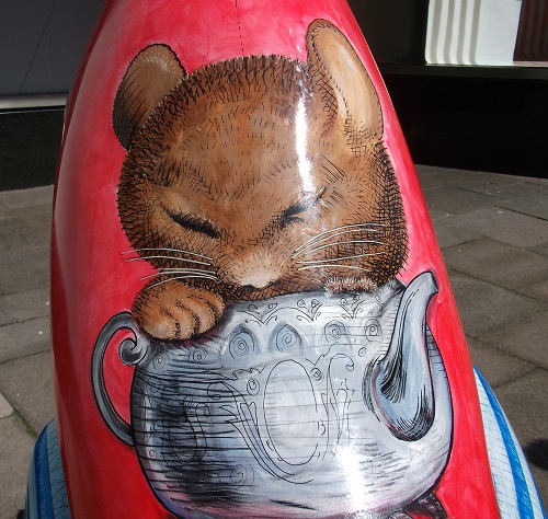 A mouse and a teacup, a close up detail of the back of the Vintage Mad March Hare sculpture