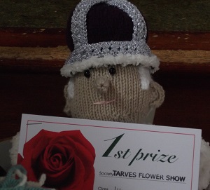 a knitted king with crown