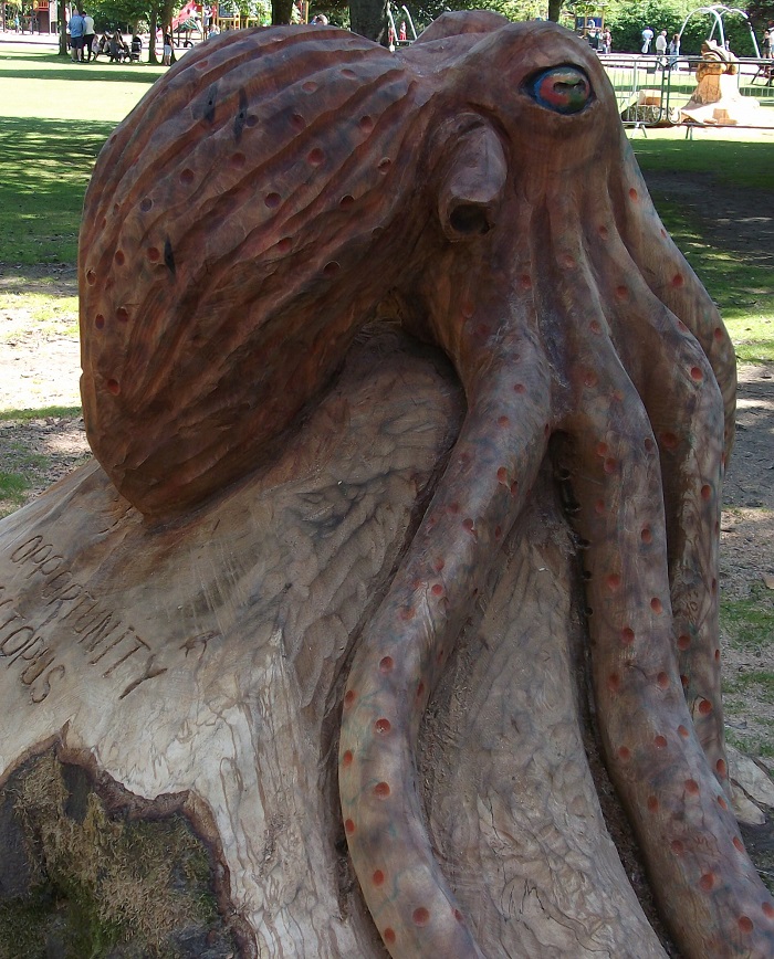 a wooden sculpture of an octopus
