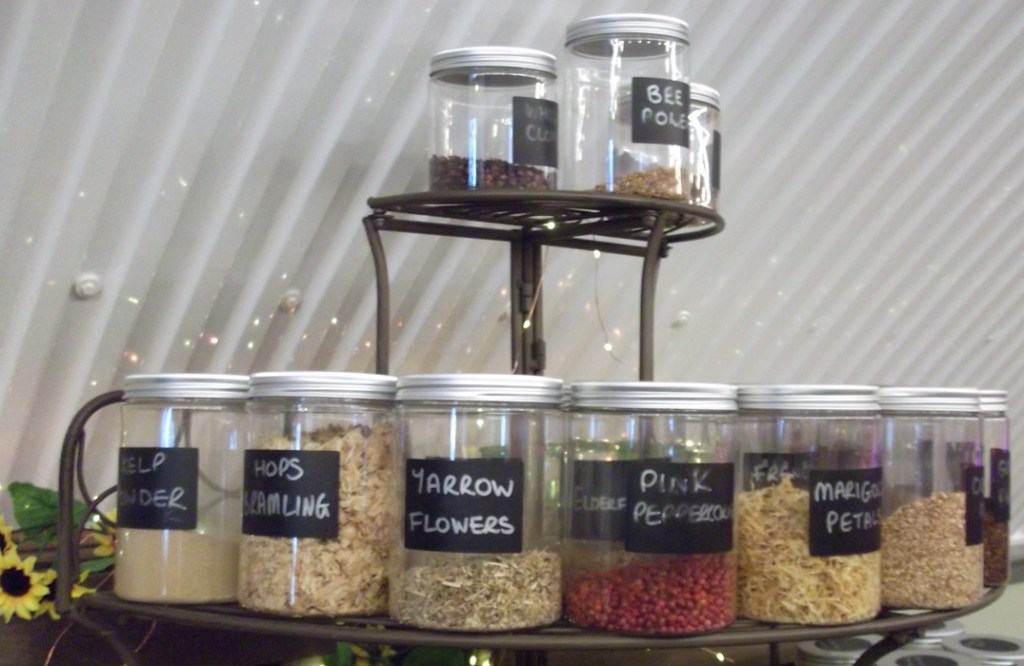 bottles of botanicals in different colours