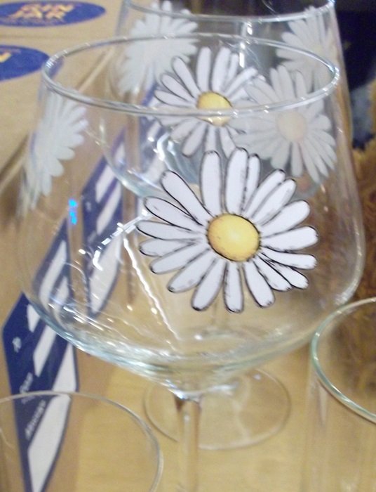 gin glass with sunflowers painted on it