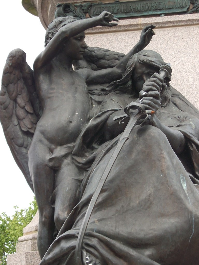 A woman breaking a sword with an angel next to her