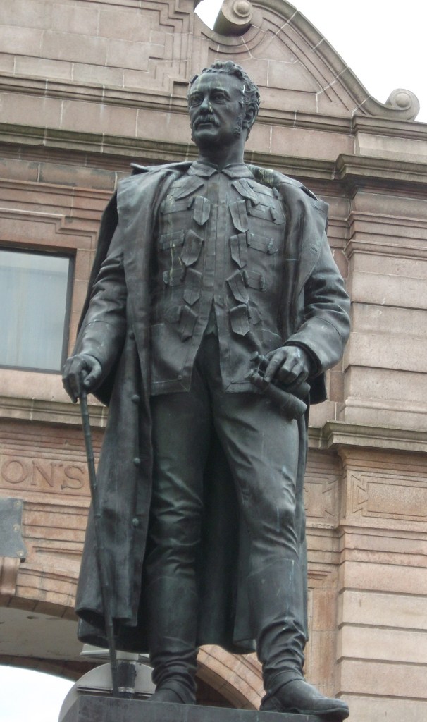 bronze statue of general in military attire 