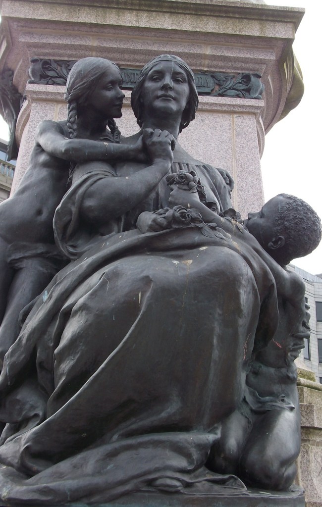 A woman with a female and make child