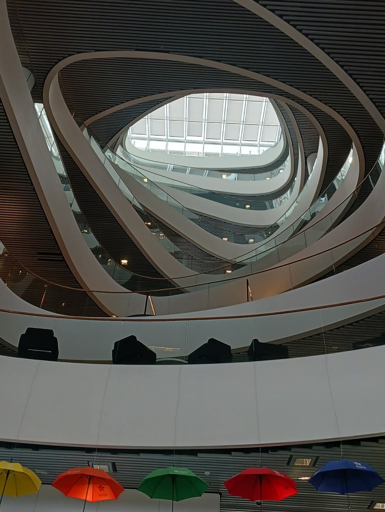 The view of a space between rising floors