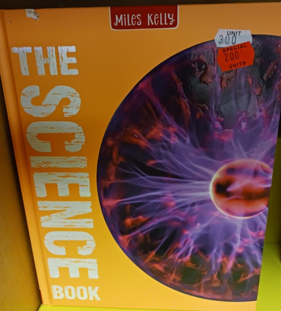 A yellow book with a purple and red plasma image, with title The Science Book
